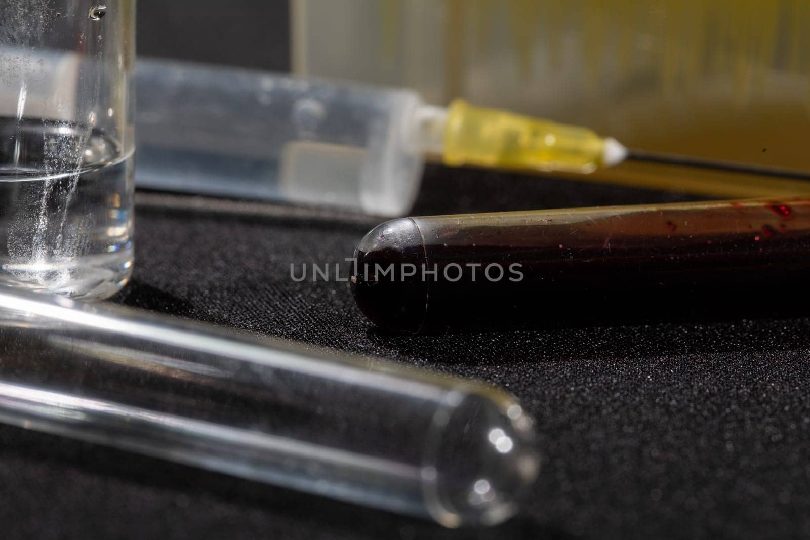 Each blood vial is transported to the laboratory for specialized tests.
