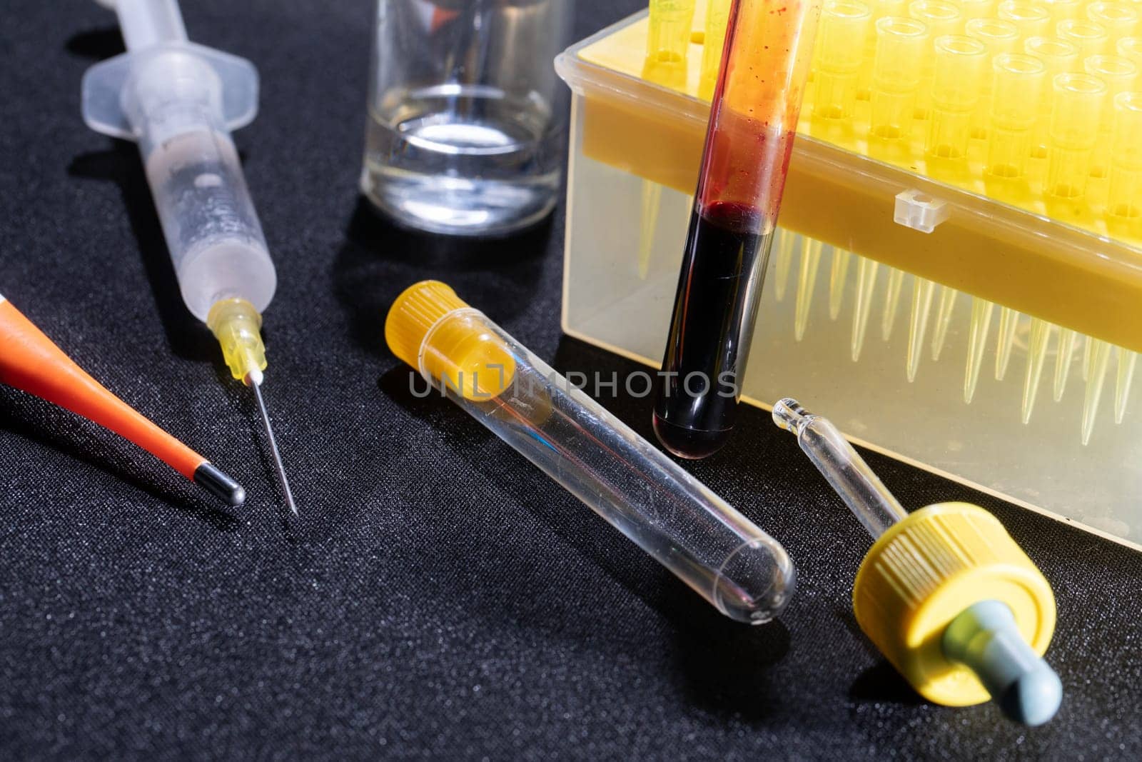 Each blood vial is transported to the laboratory for specialized tests.