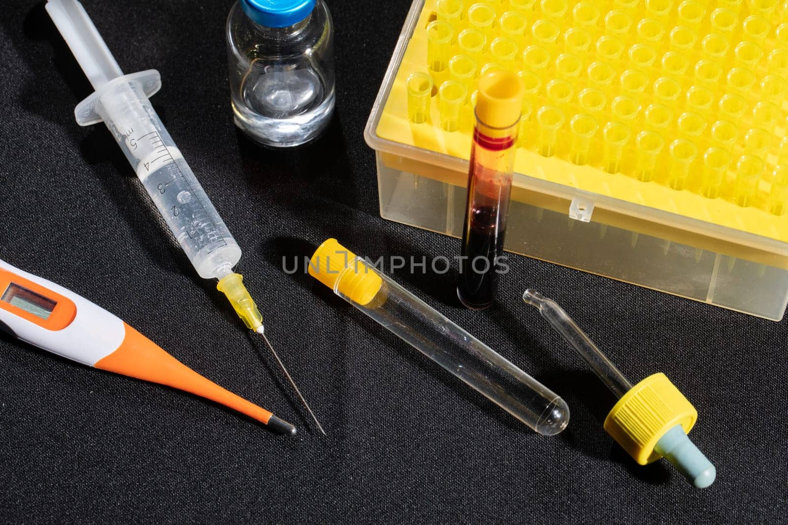 Each blood vial is transported to the laboratory for specialized tests.