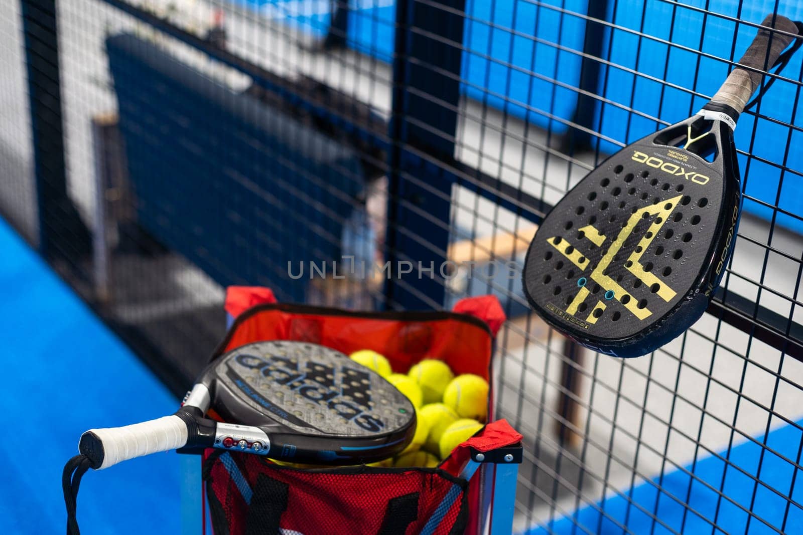 Kyiv, Ukraine. March 22, 2024, Paddle tennis rackets on the court. High quality photo