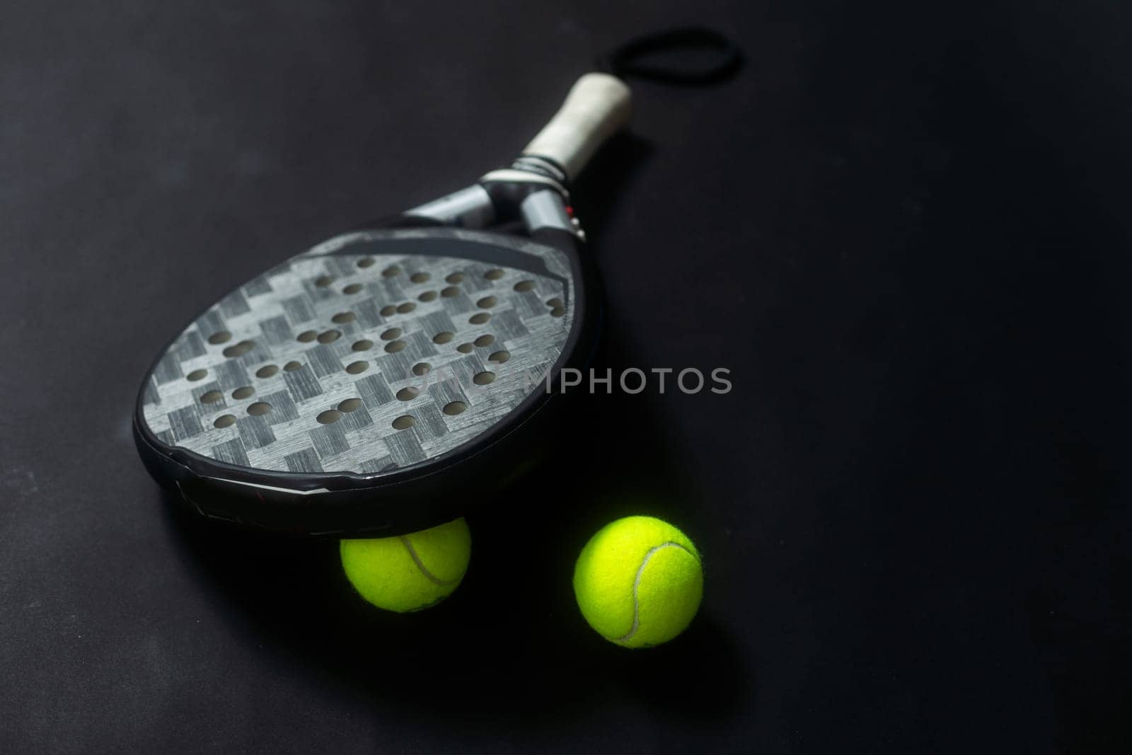Isolated paddle tennis objects black background. High quality photo