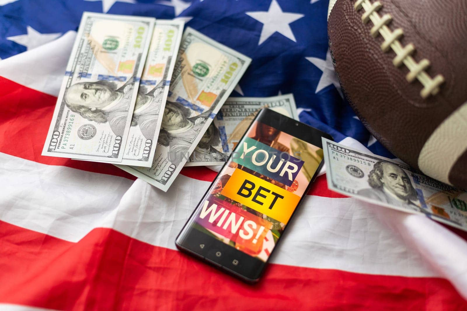 rugby ball and dollars with usa flag and smartphone bet by Andelov13