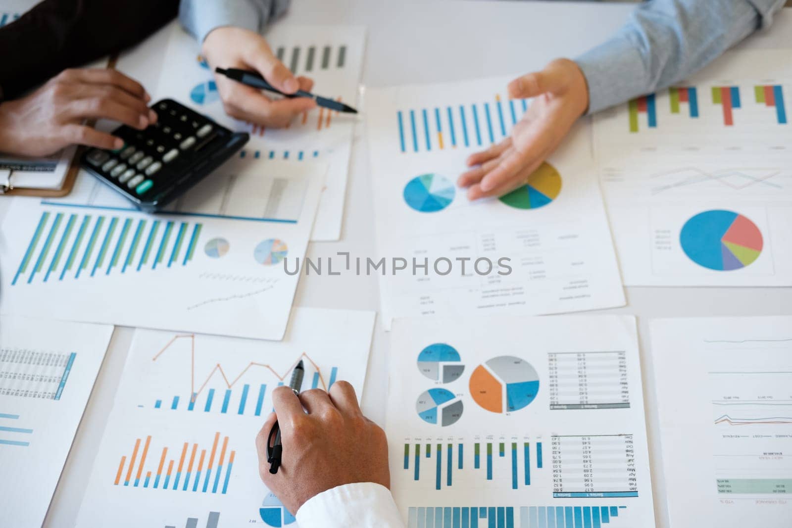 Businessman, new generation business owner Or a startup is brainstorming, meeting and analyzing data for an investment project.