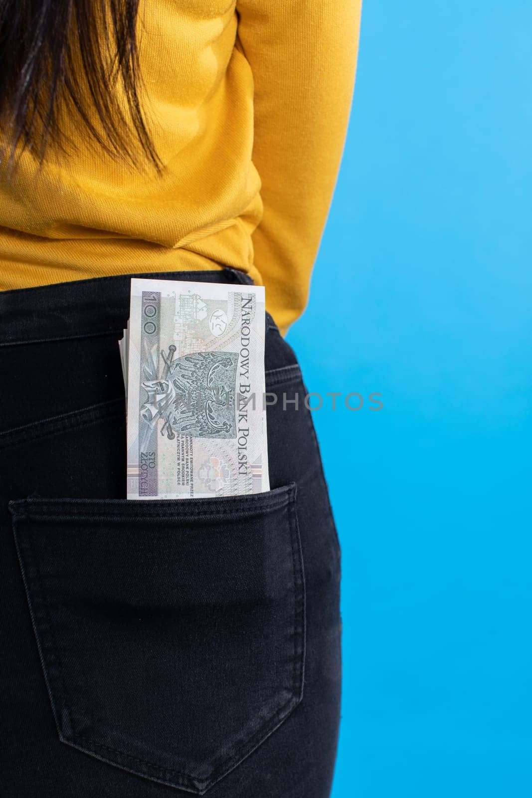 A cash file in the back pocket is a sign of financial wealth.