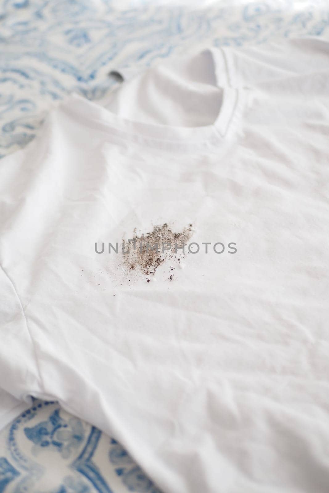 white color dirty shirt, showing making stain.