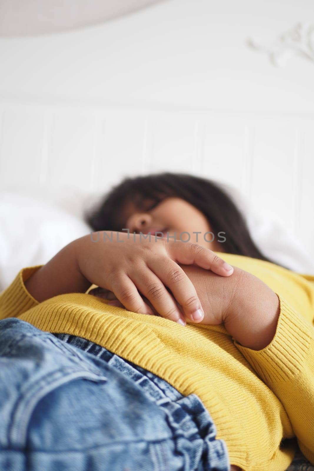 a child sleeping in bed, selective focus