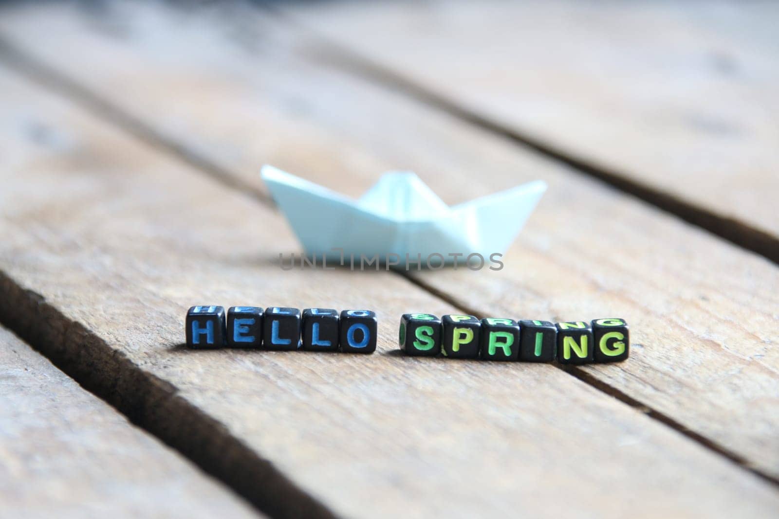 Hello Spring concept. Inscription on the cubes. by Markgraf