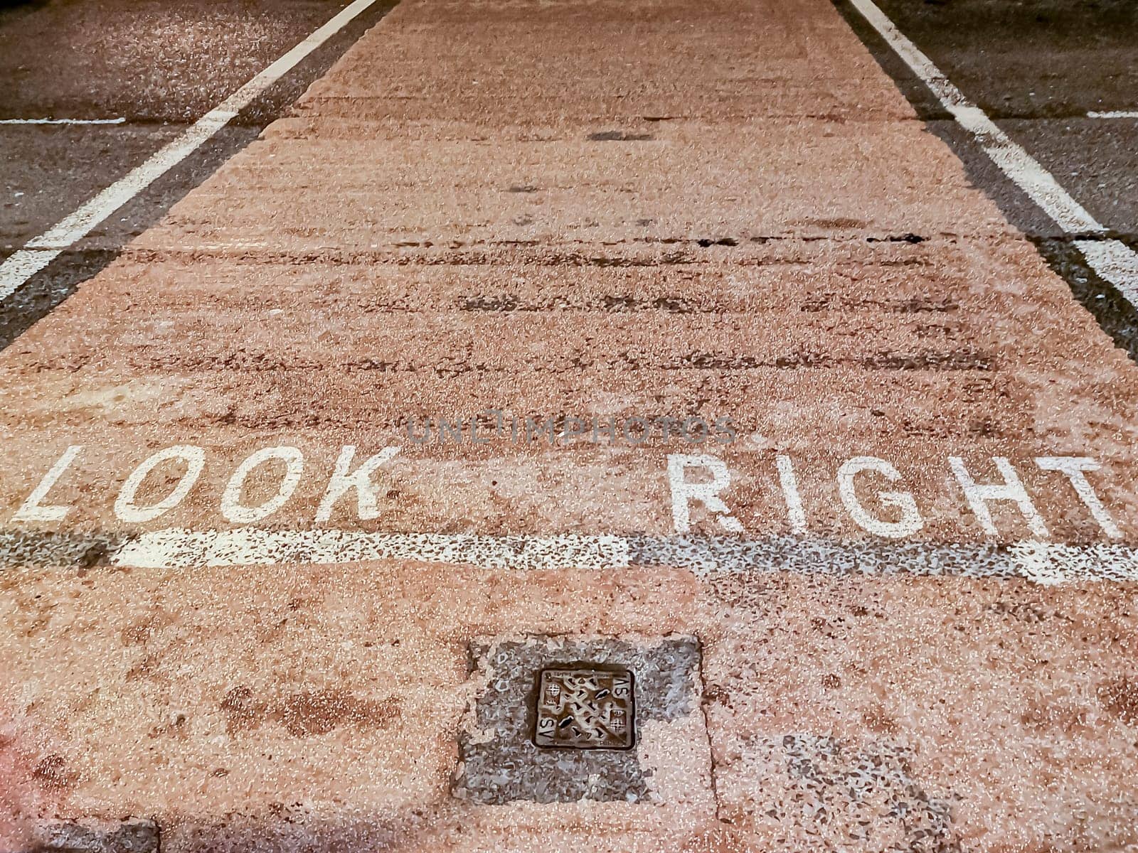 Look right warning painted on the tarmac in Ireland.