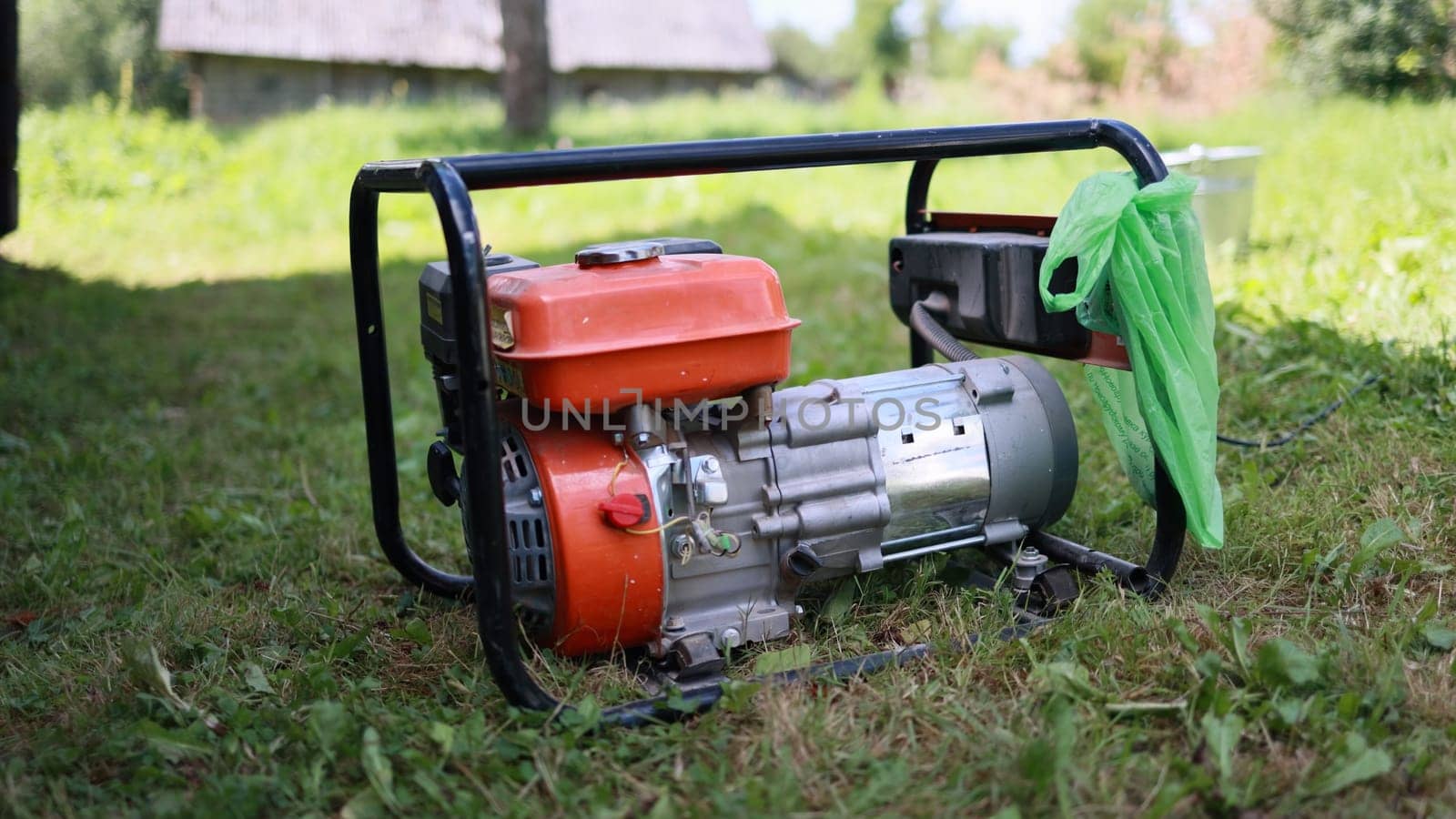 Gasoline-powered electric generator in a state of operation. by DovidPro