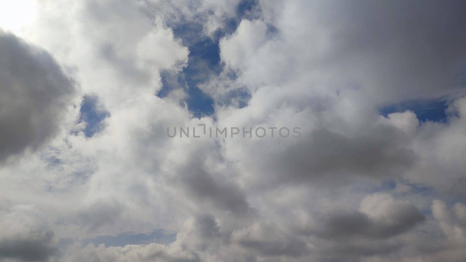 Blue gray light sky nature white clouds whether background . High quality photo