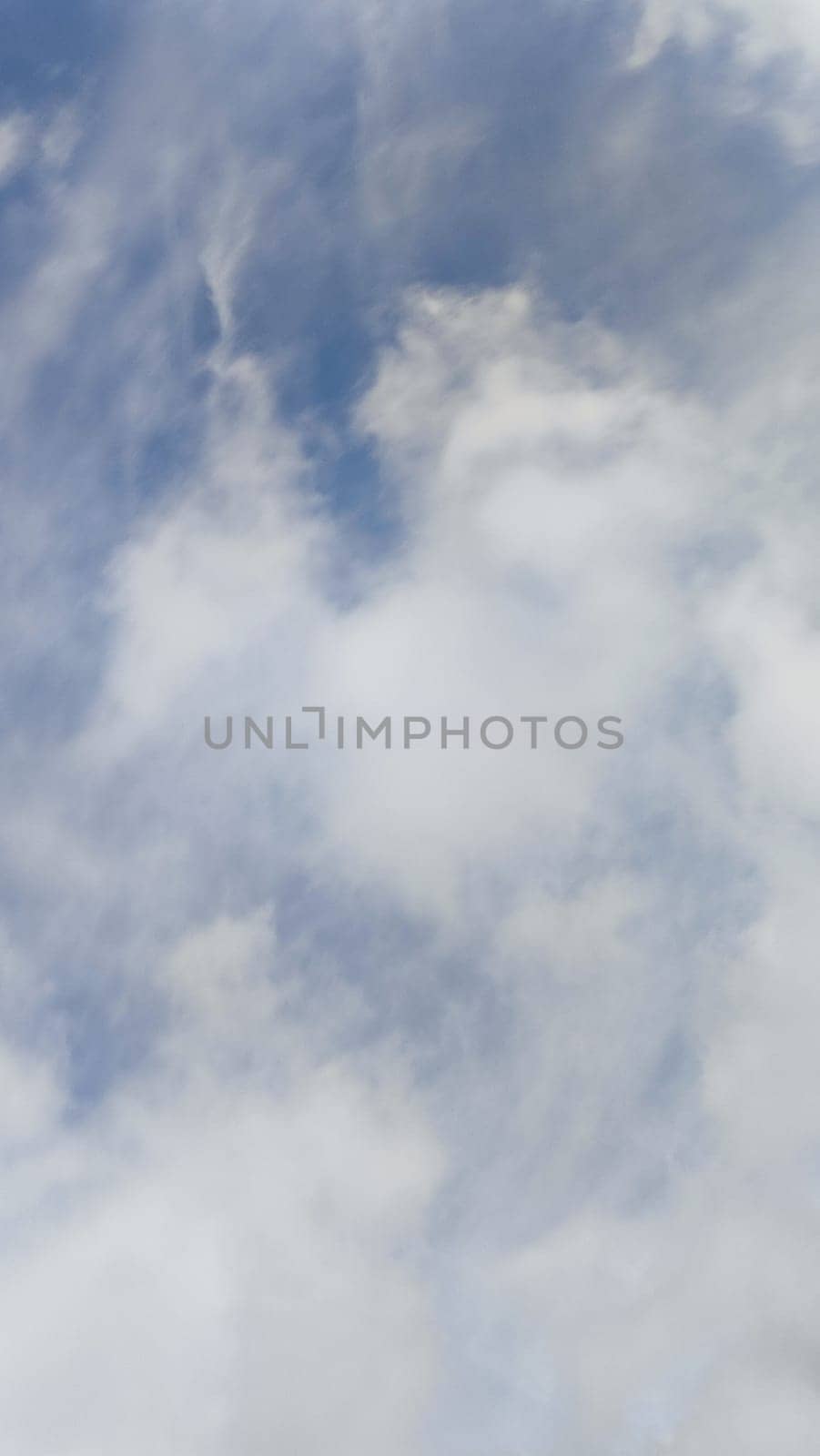 Blue gray light sky nature white clouds whether background . High quality photo
