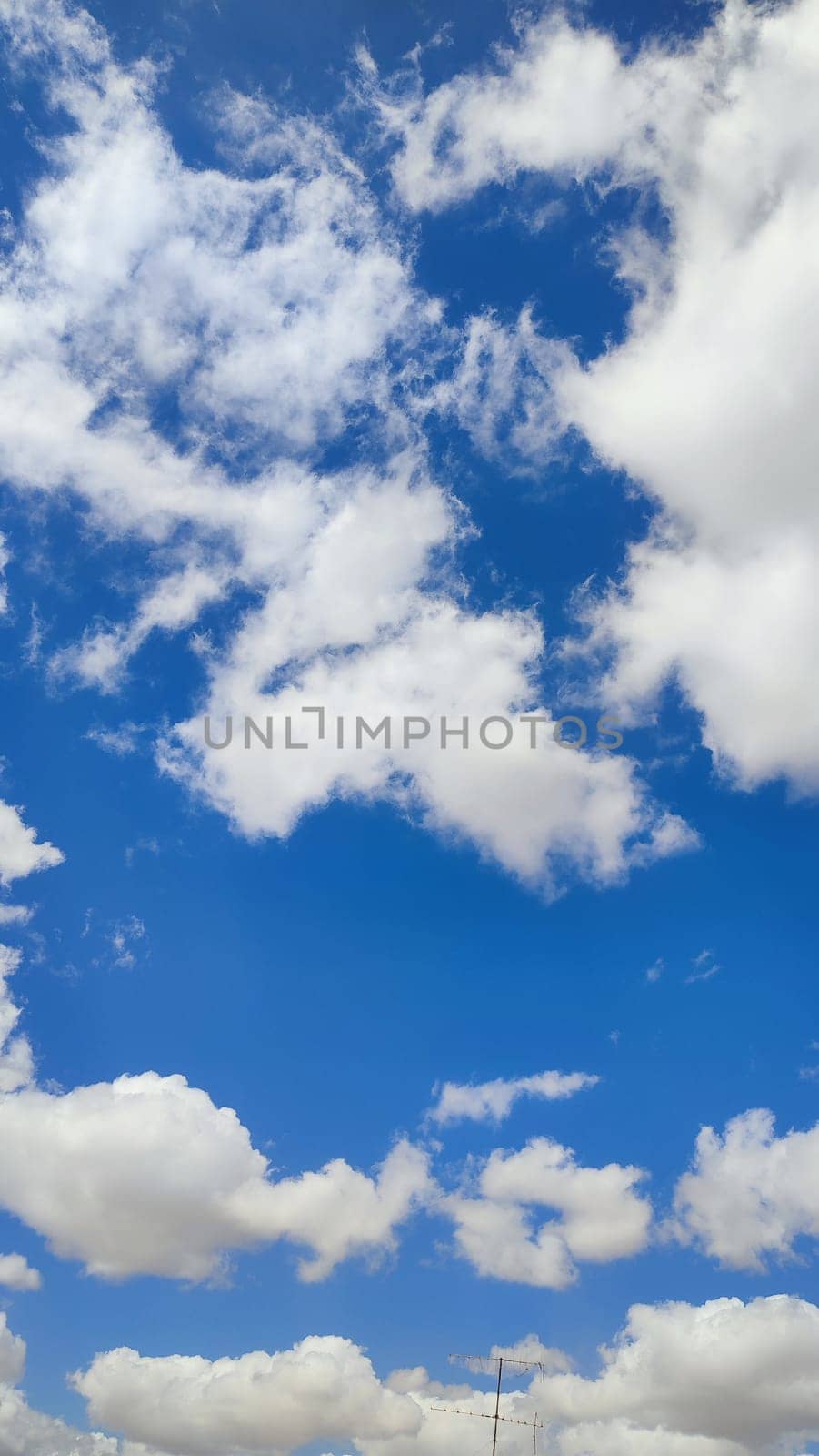 Blue gray light sky nature white clouds whether background . High quality photo