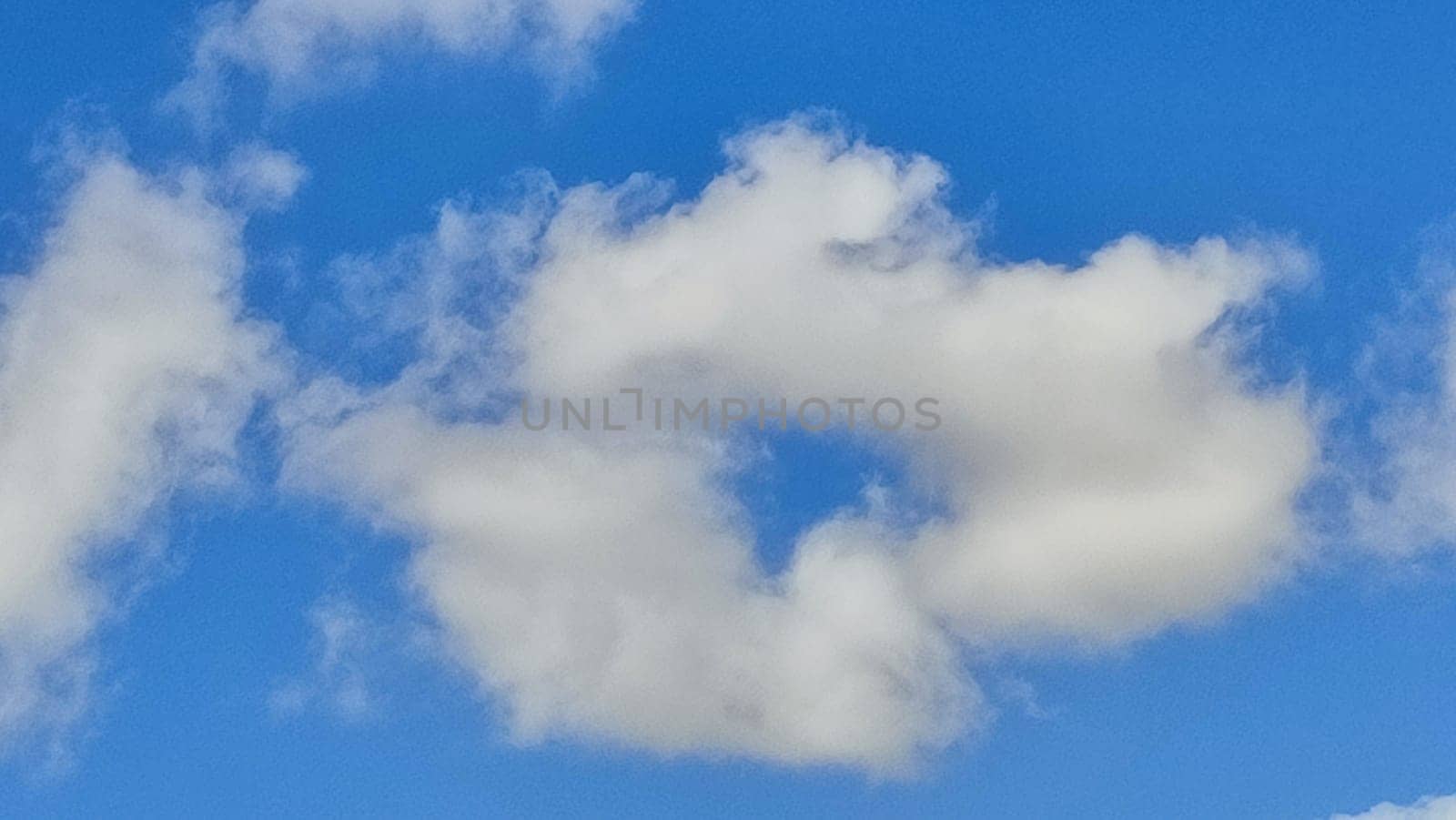 Blue gray light sky nature white clouds whether background . High quality photo