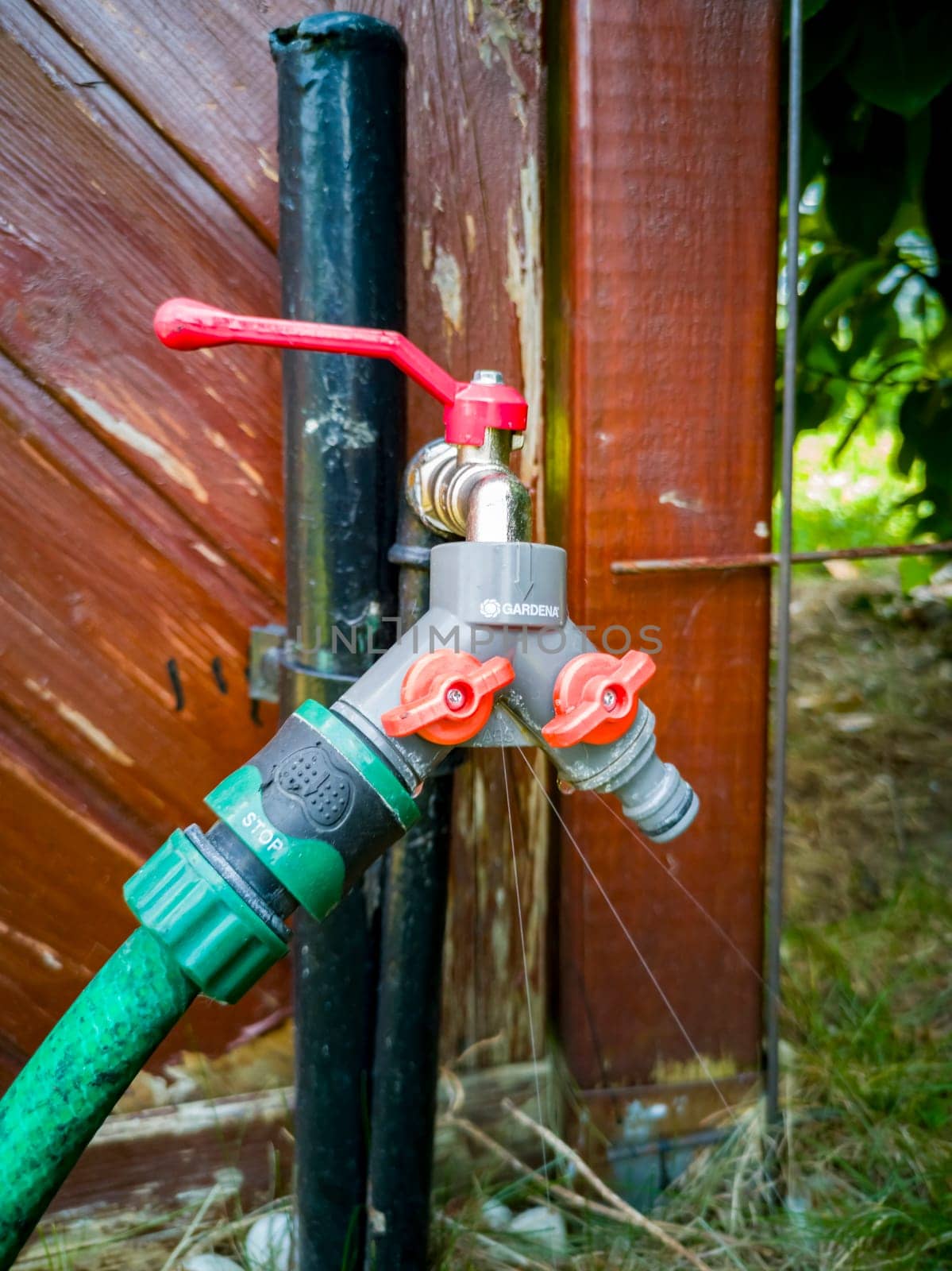 MOERS, GERMANY - JULY 10 2019 : The water tap is leaking.