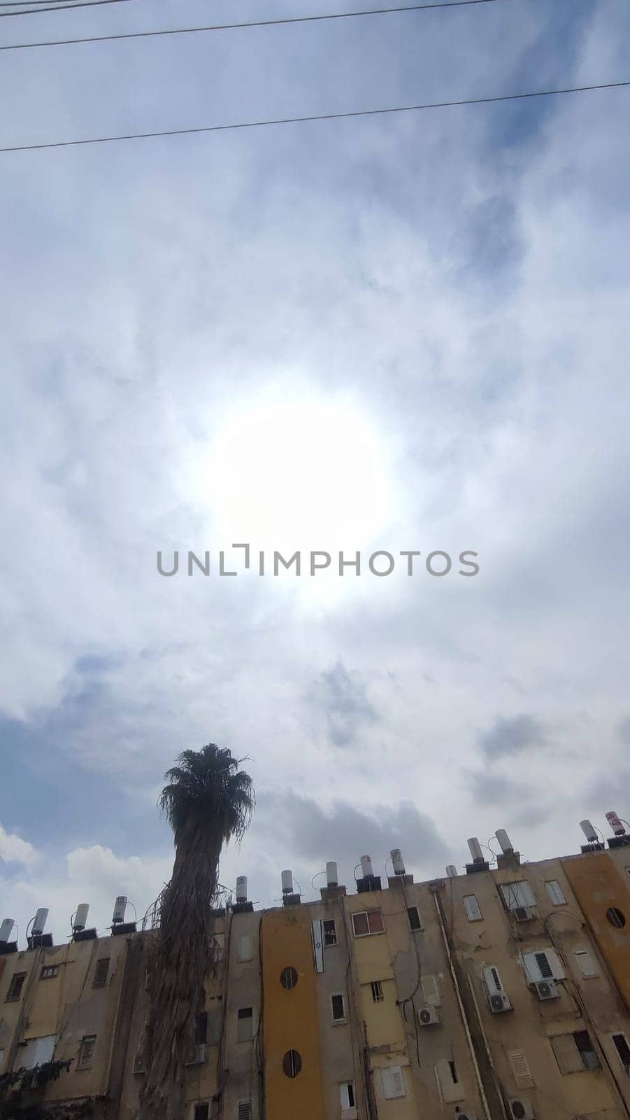 Blue gray light sky nature white clouds whether background , city town. High quality photo