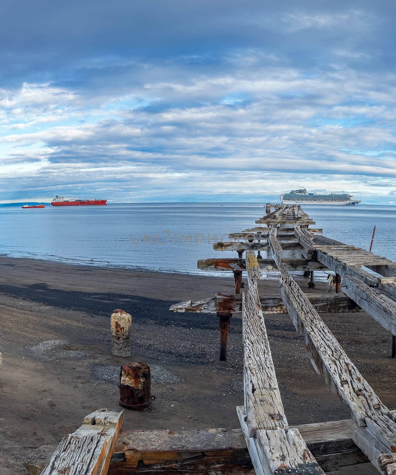 Rustic Wooden Pier Leading to Tranquil Sea with Ships by FerradalFCG