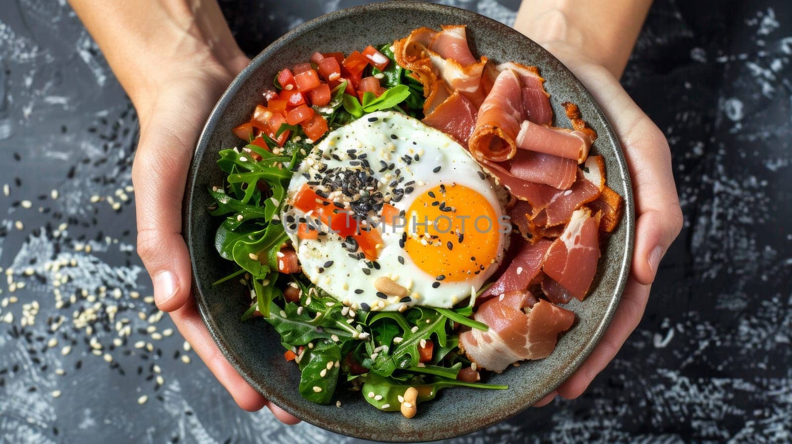 A person holding a bowl of food with an egg on top