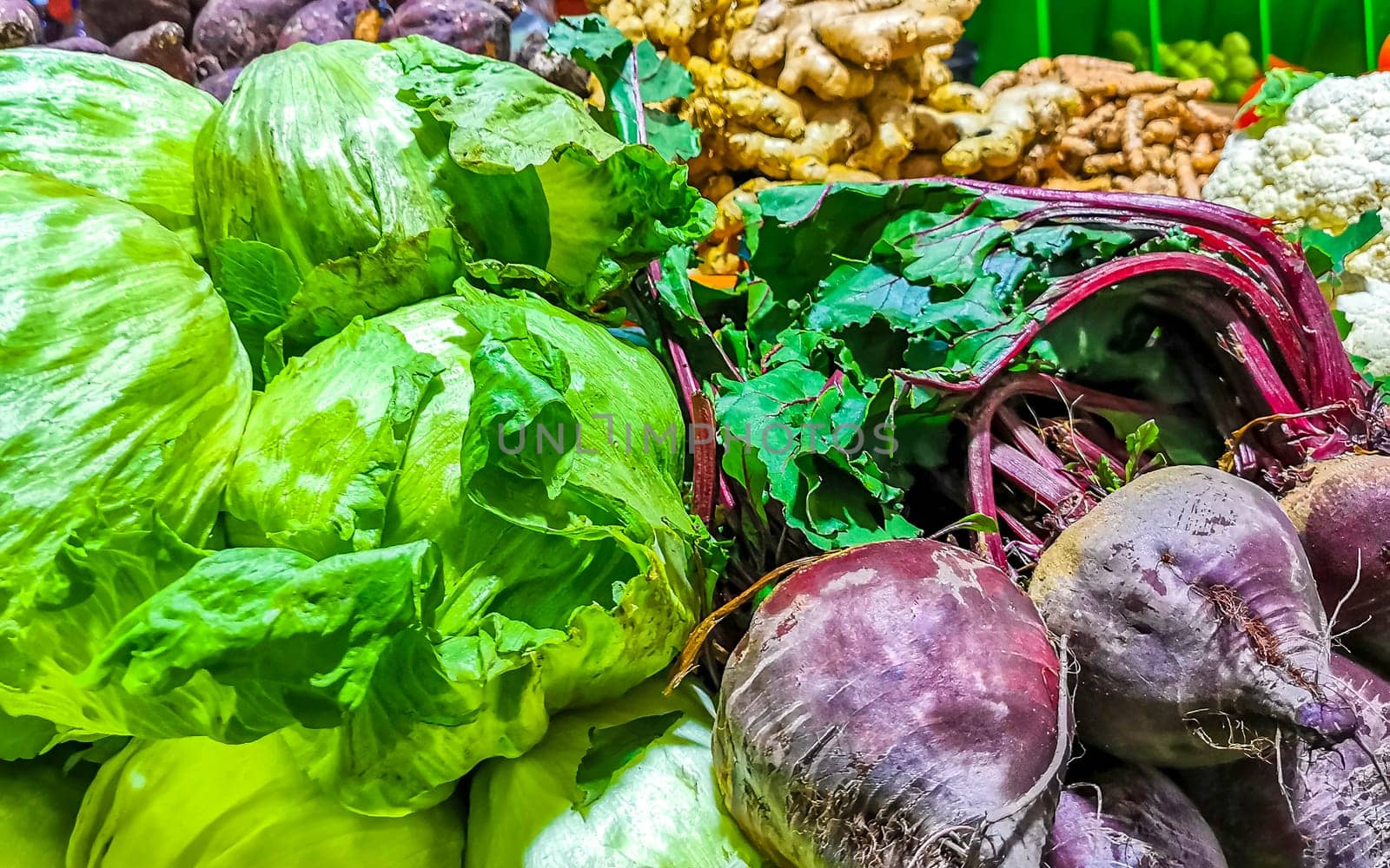 Fresh vegetables Fruit and salad Greens Herbs at the mexican market in Zicatela Puerto Escondido Oaxaca Mexico.