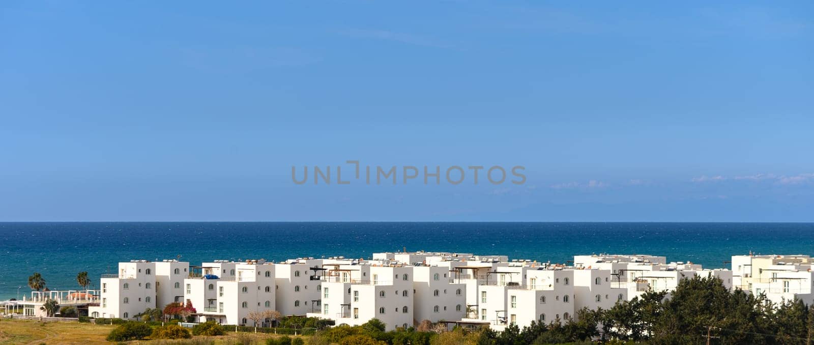 Traditional mediterranean white house with pool on hill with stunning sea view. Summer vacation background. by Mixa74