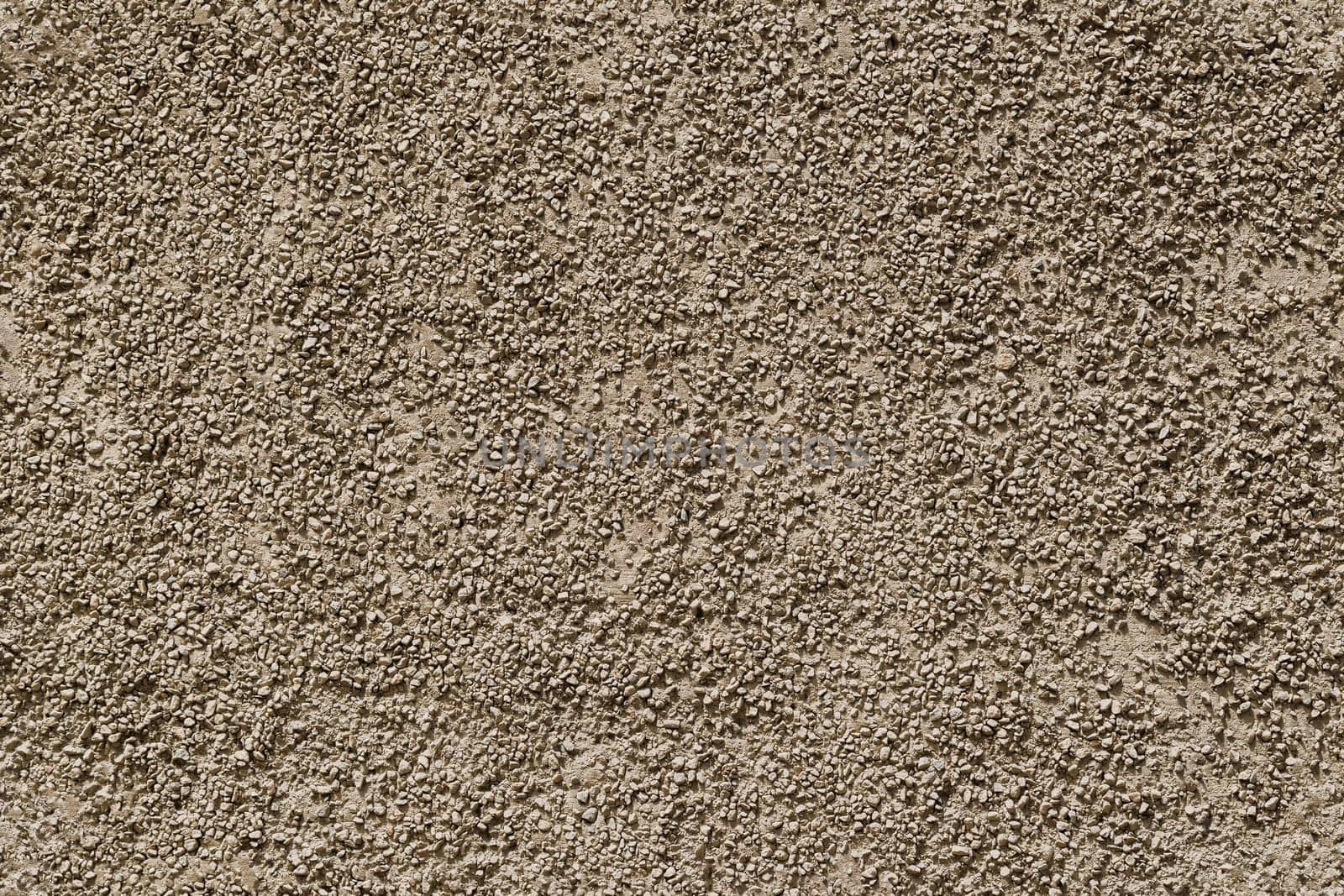 small gravel stucco wall finish seamless texture and full-frame background.