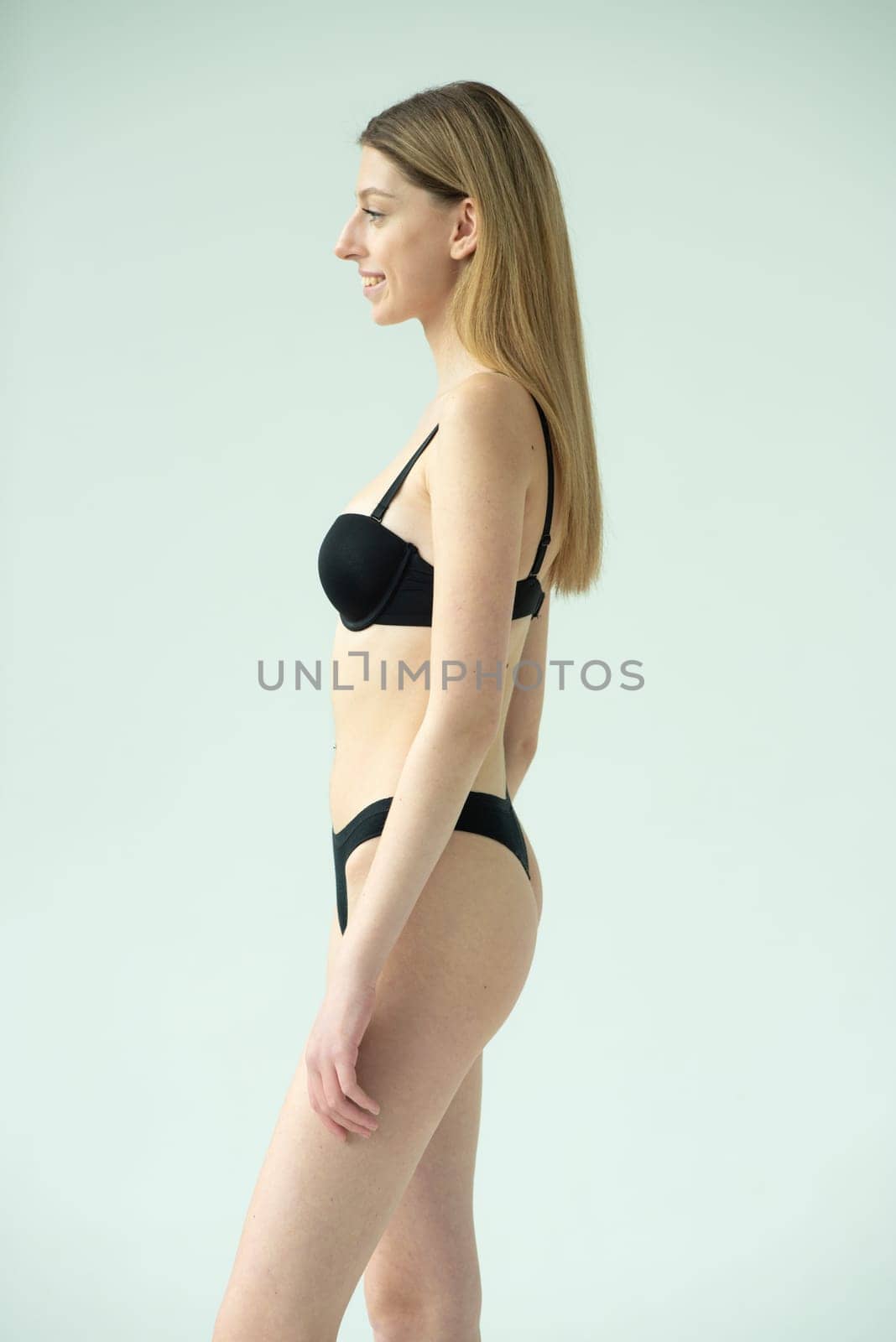 Studio model test, snap, polaroid. Beautiful young european woman on white background by OleksandrLipko