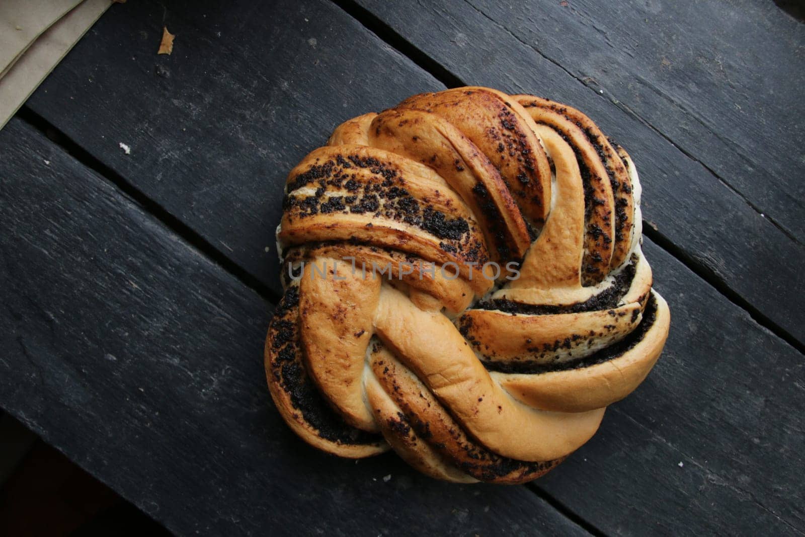 Homemade bread brezel rolls with seeds. by Markgraf