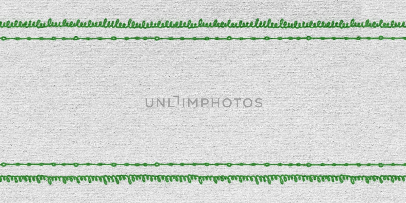 A close-up view of a piece of paper with evenly spaced green lines running vertically. The lines create a grid pattern across the paper, enhancing its organization and structure.