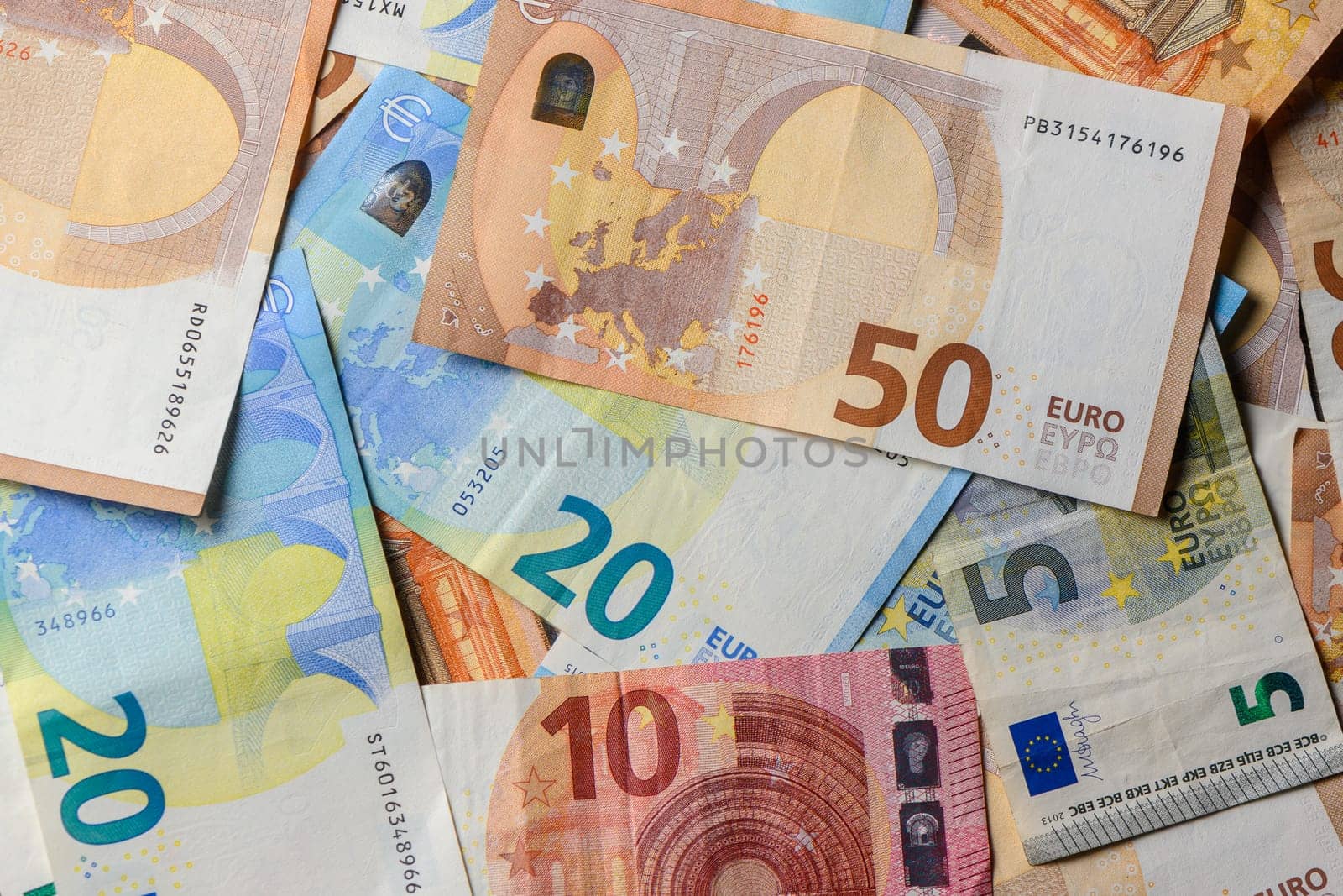 pile of paper euro banknotes as part of the united country's payment system 6