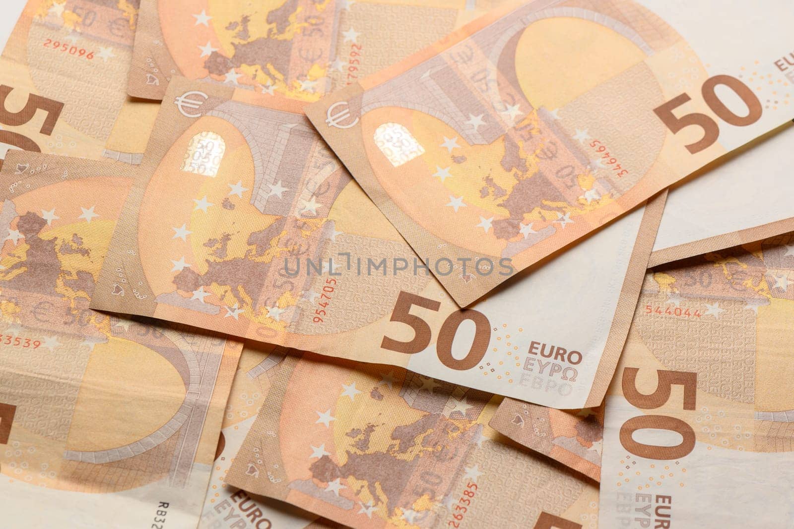 Pile of 50 euro notes business background.1