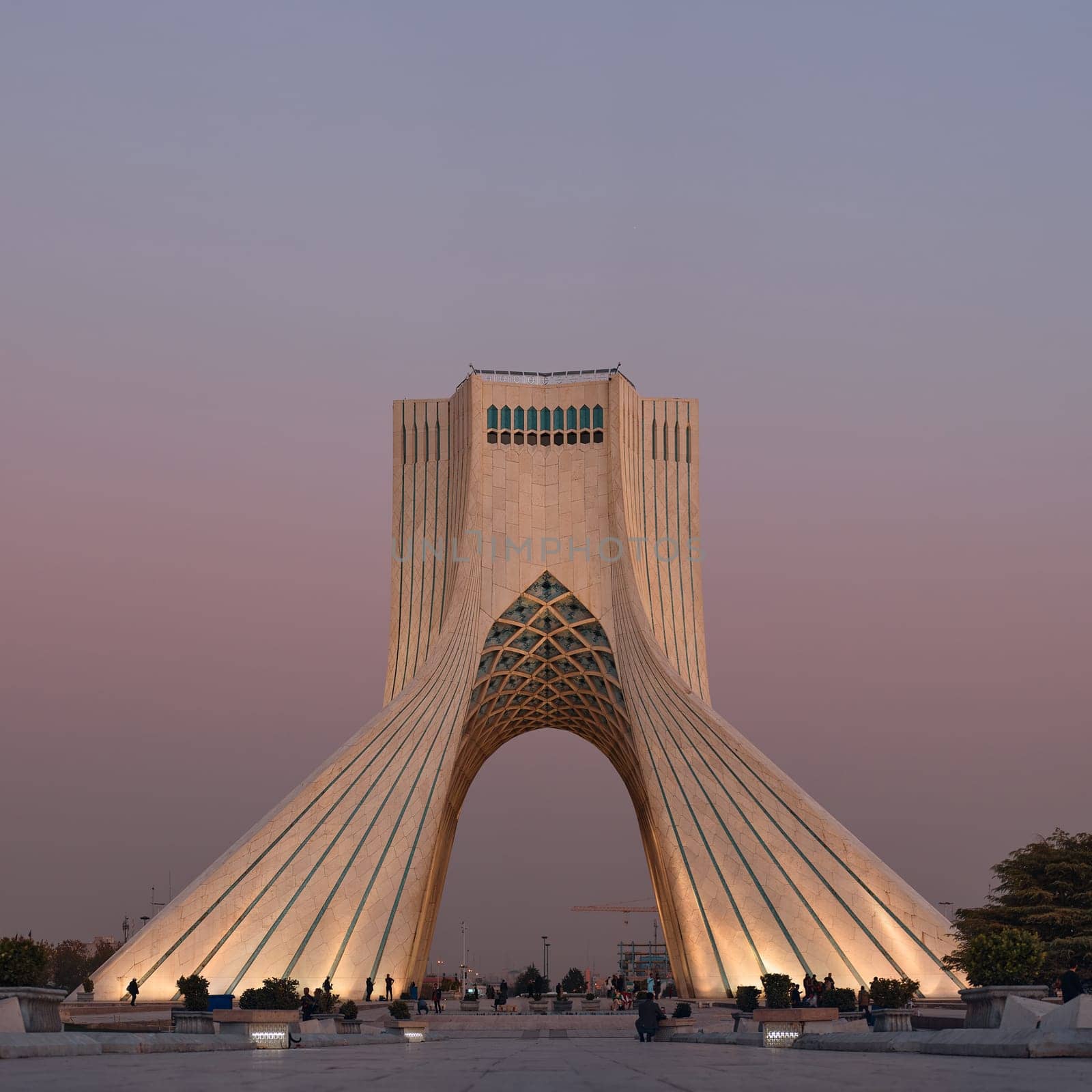 The Azadi Tower is a symbol of freedom in Iran, the main symbol of Iran's capital. MS ZI LA Azadi Tower - Freedom Tower, the gateway to Tehran, Popular tourist point at twilight. 02.12.22 Tehran, Iran by EvgeniyQW