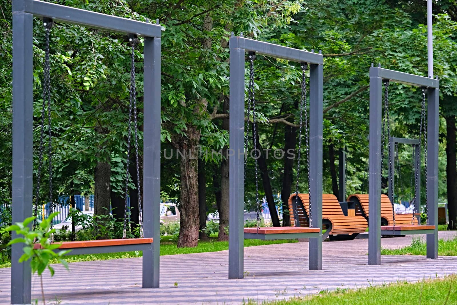 Swing in the city park. general plan by lempro