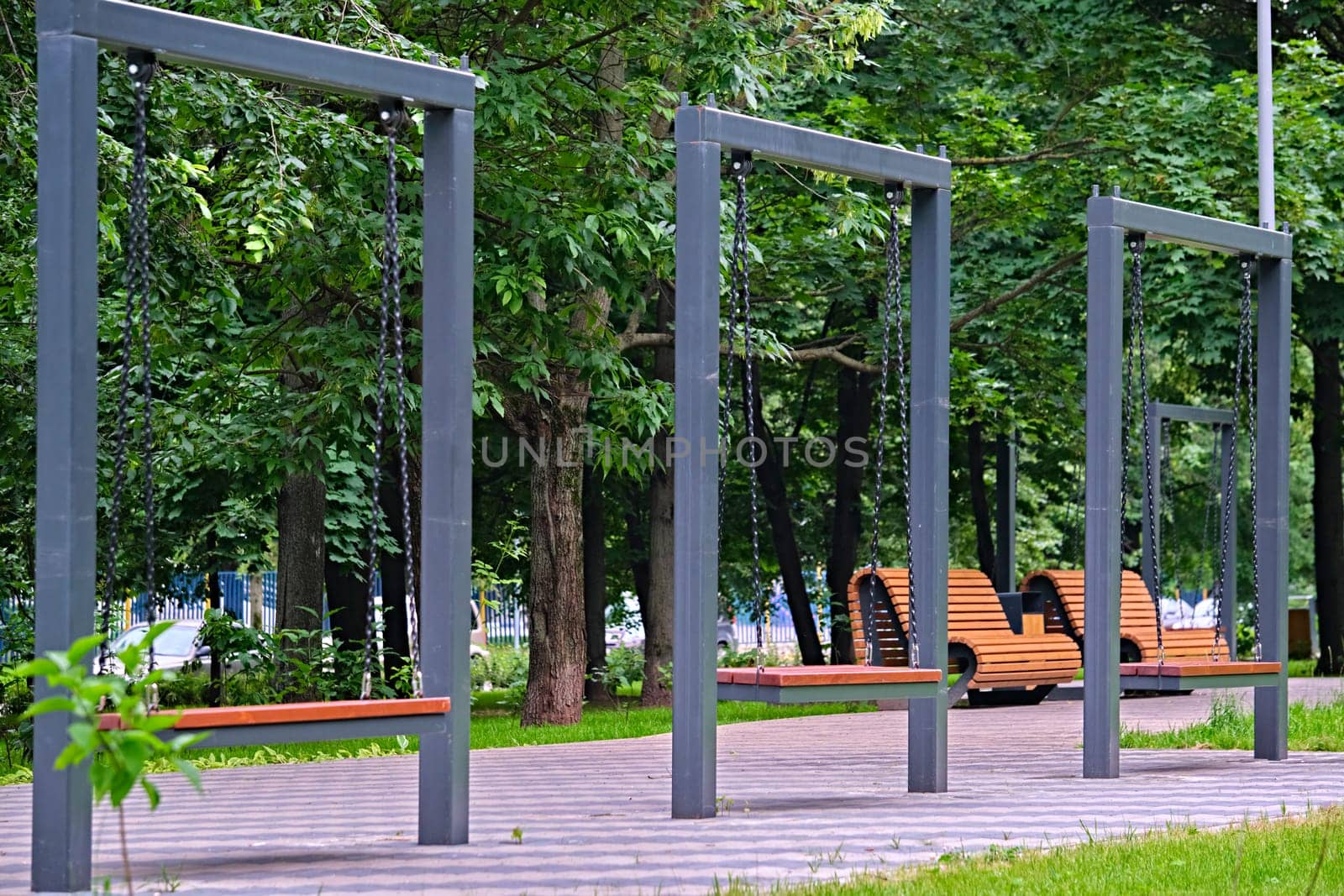 Swing in the city park. general plan by lempro