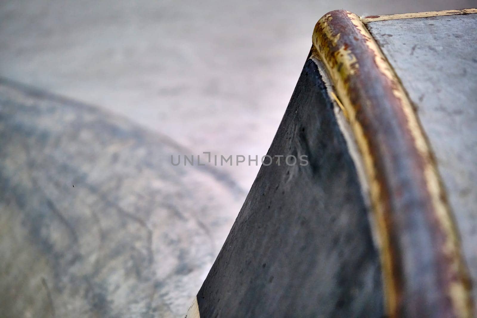 Jumps and Ramps in a Skateboard Park. close-up by lempro