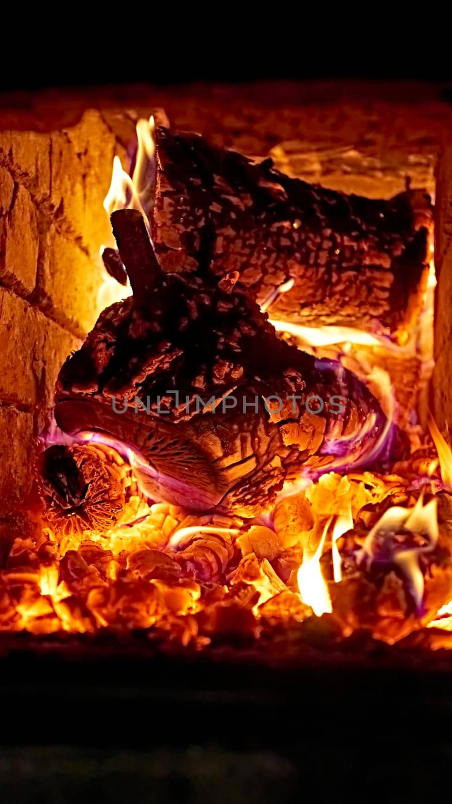 wood burn in a Russian furnace. Background. natural light. color