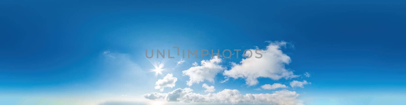 Seamless panorama of sky with light clouds in spherical equirectangular format with complete zenith for use in 3D graphics, game and for composites in aerial drone 360 degree panoramas as a sky dome