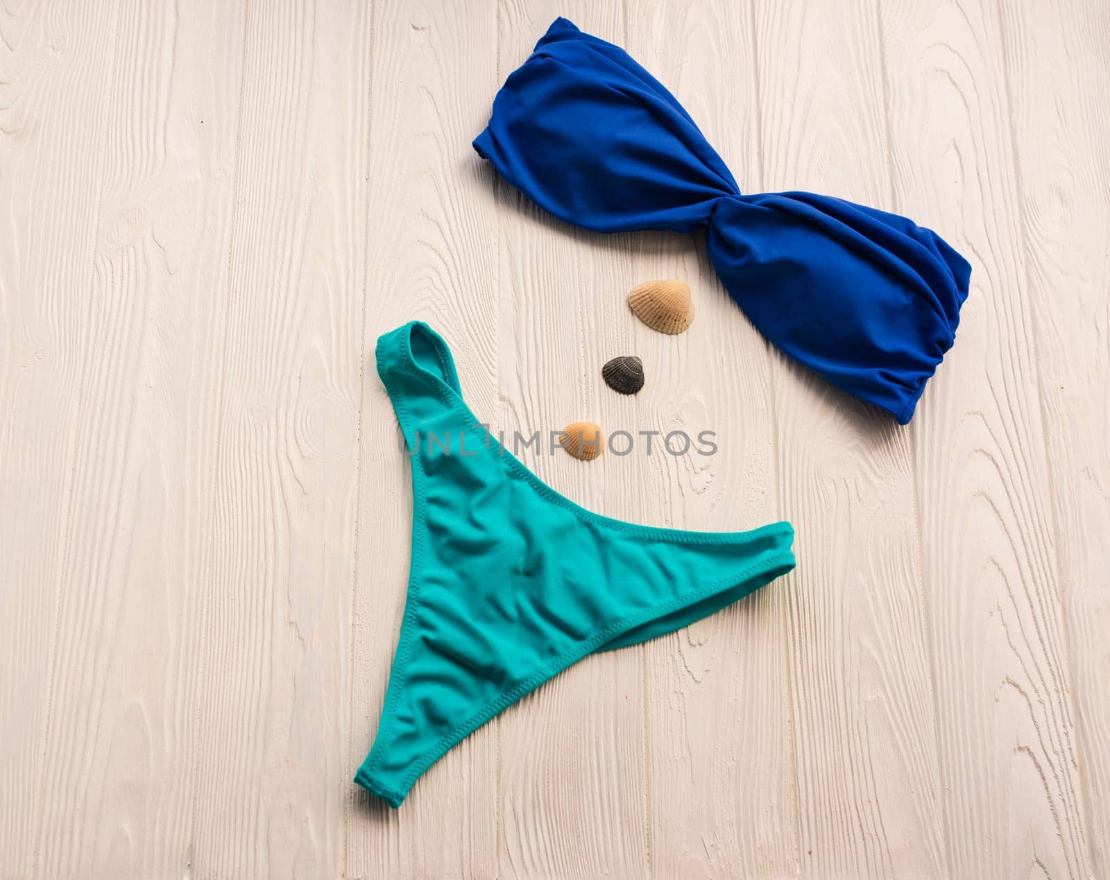 Women split multicolor blue swimsuit bikini. Summer background mockup template by AndriiDrachuk