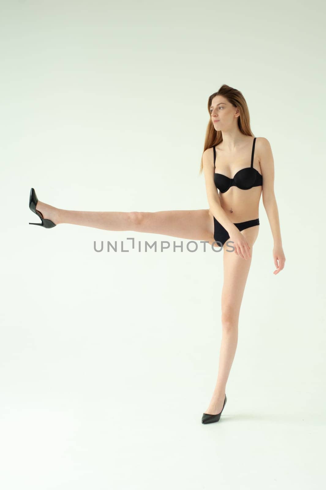 Studio model test, snap, polaroid. Beautiful young european woman on white background by OleksandrLipko