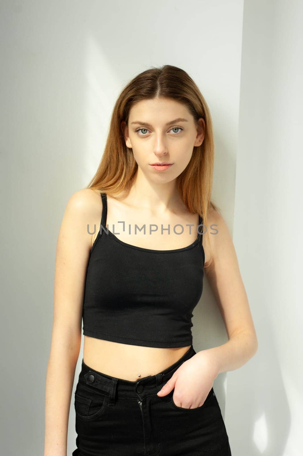 Studio model test, snap, polaroid. Beautiful young european woman on white background by OleksandrLipko