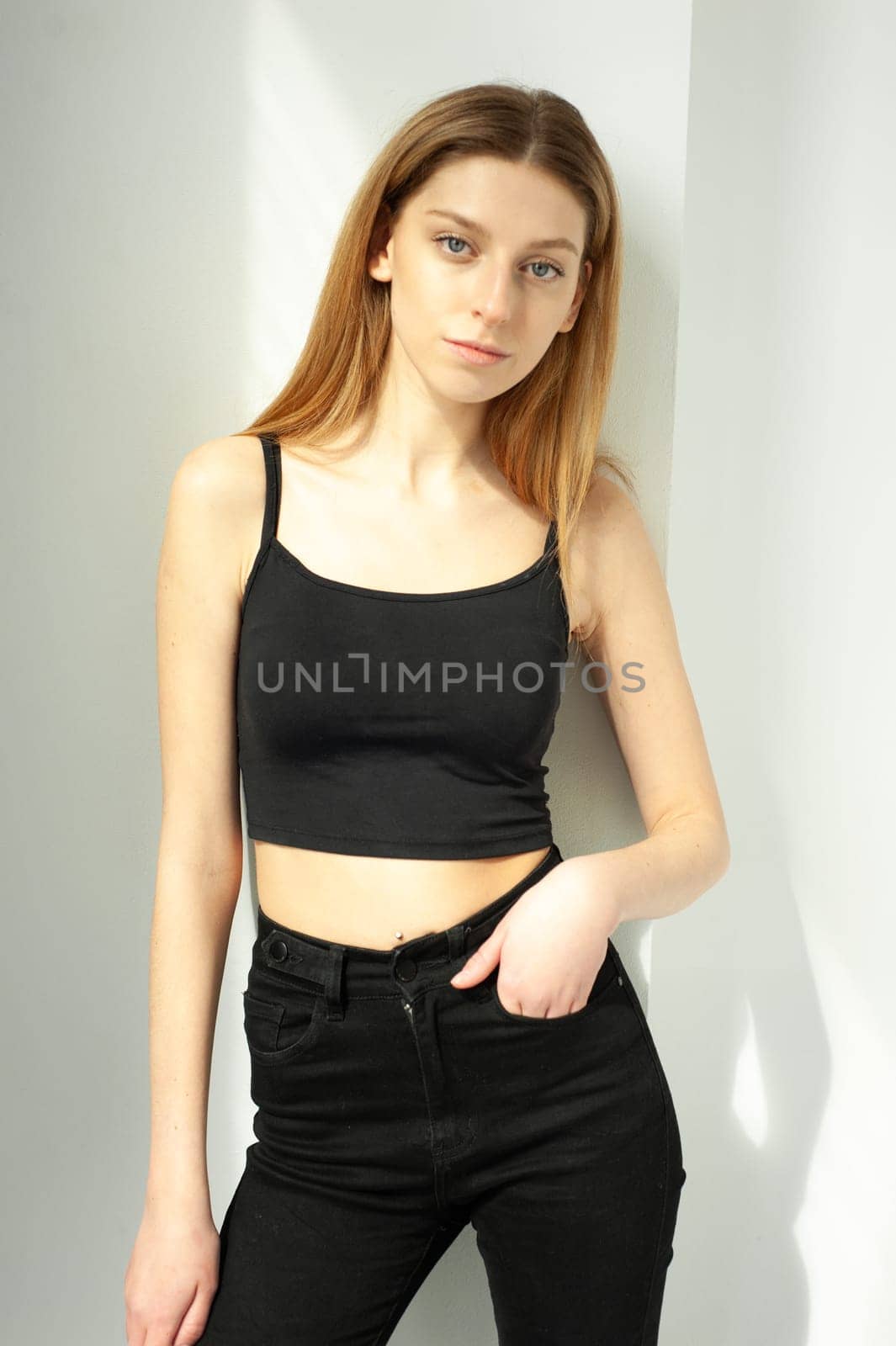 Studio model test, snap, polaroid. Beautiful young european woman on white background by OleksandrLipko