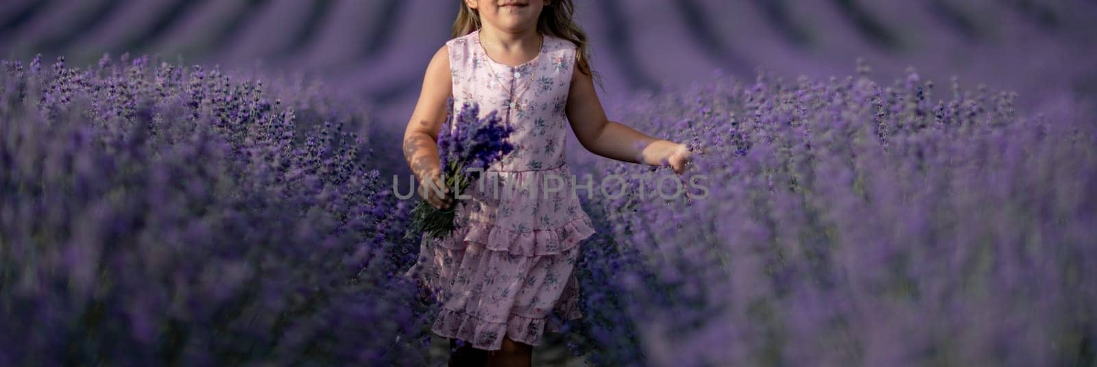 Lavender field girl. happy girl in pink dress in a lilac field of lavender. Aromatherapy concept, lavender oil, photo session in lavender by Matiunina