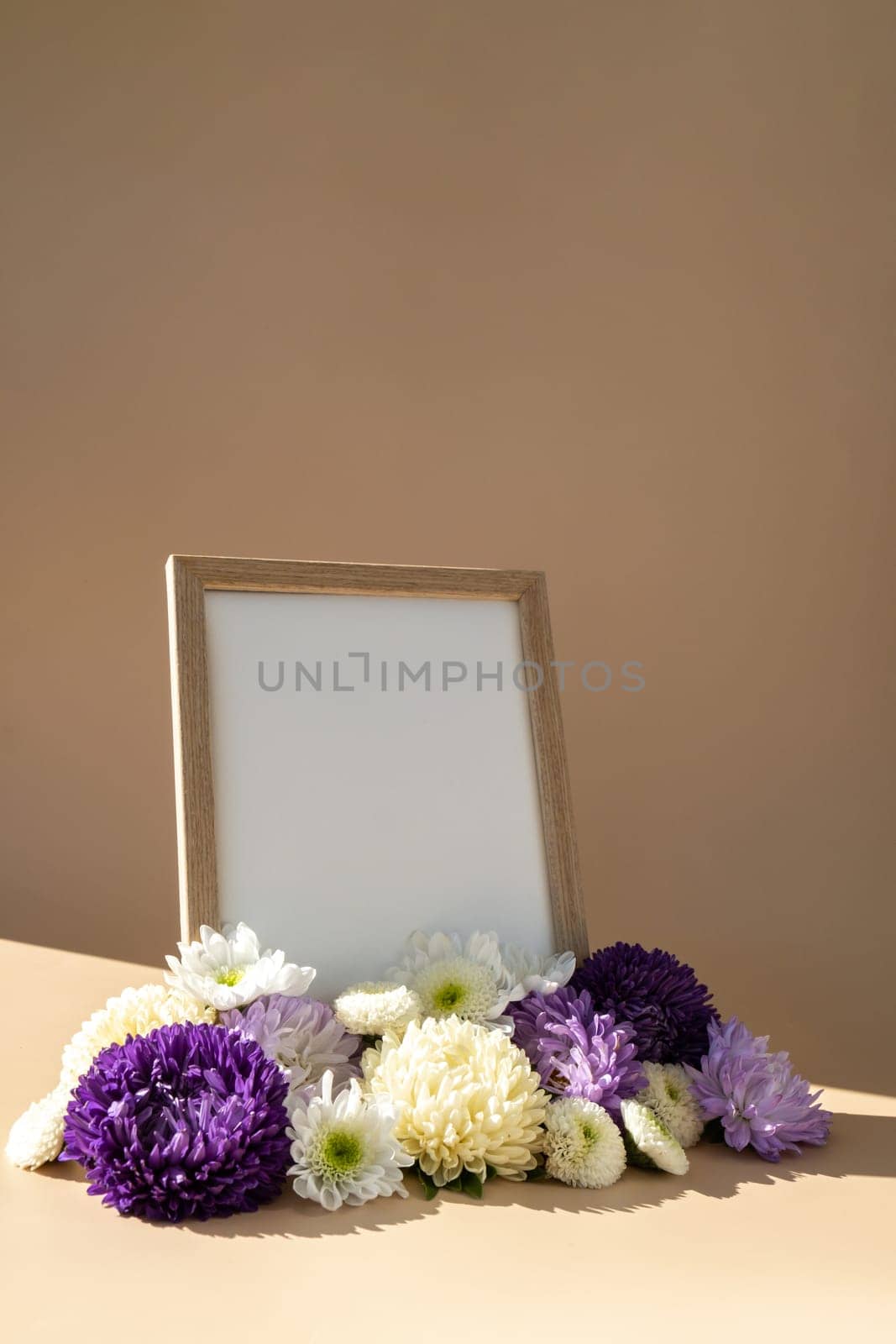 Empty paper frame with copy space for text. Mock up template. Isometric style Colorful white and violet flowers around. Holiday greeting card. Minimalistic spring concept women's day, easter by anna_stasiia