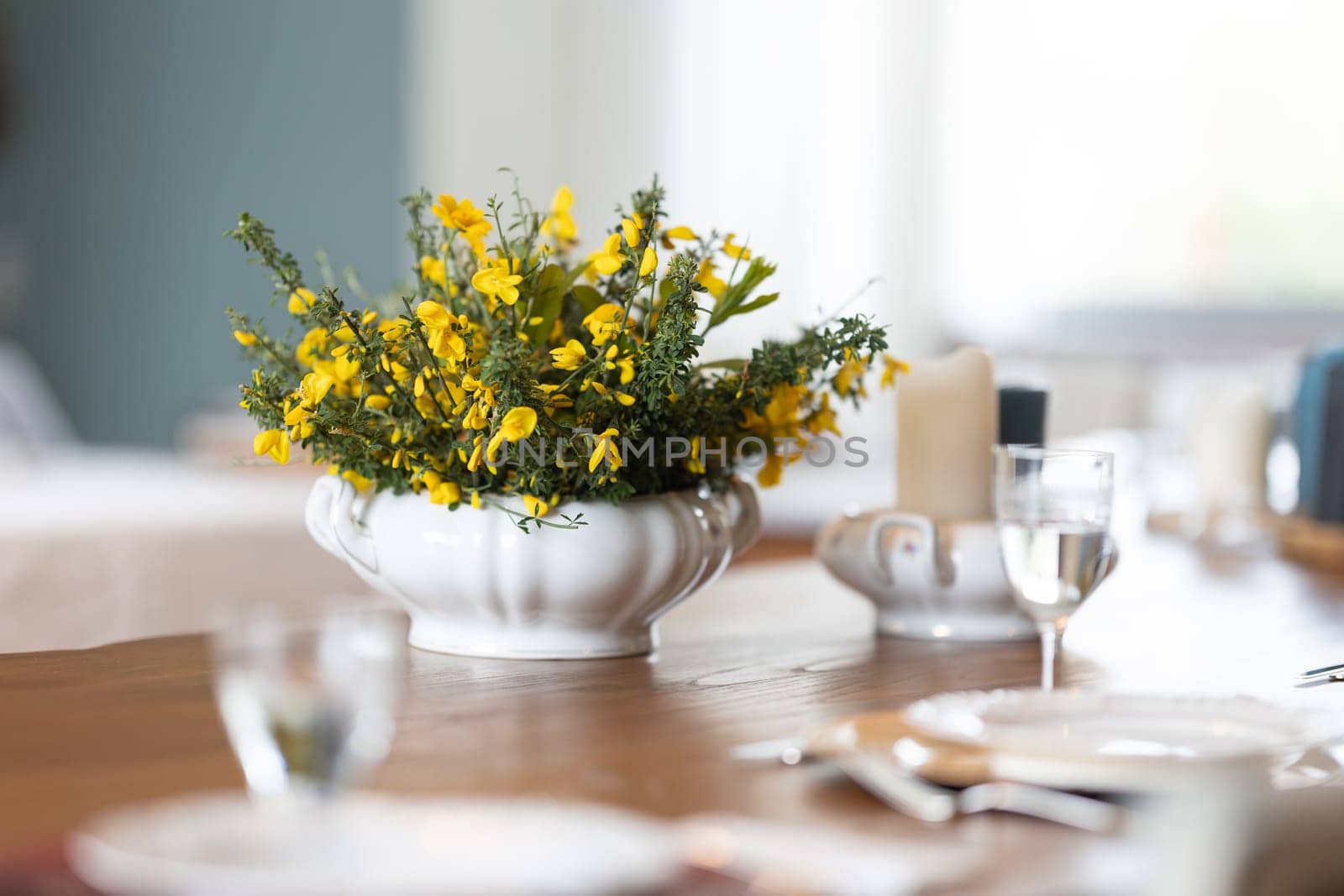 vase with flowers on the dining table - serving by Studia72