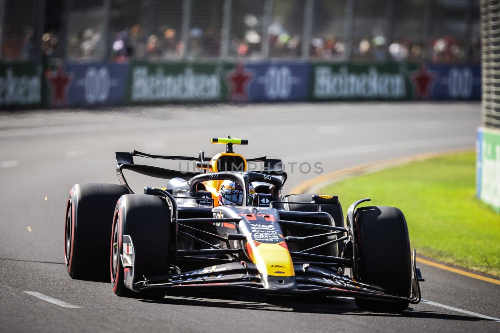 MELBOURNE, AUSTRALIA - MARCH 23: Sergio Perez of Mexico drives the Oracle Red Bull Racing RB20 during qualifying in the 2024 Australian Grand Prix at Albert Park in Melbourne, Australia