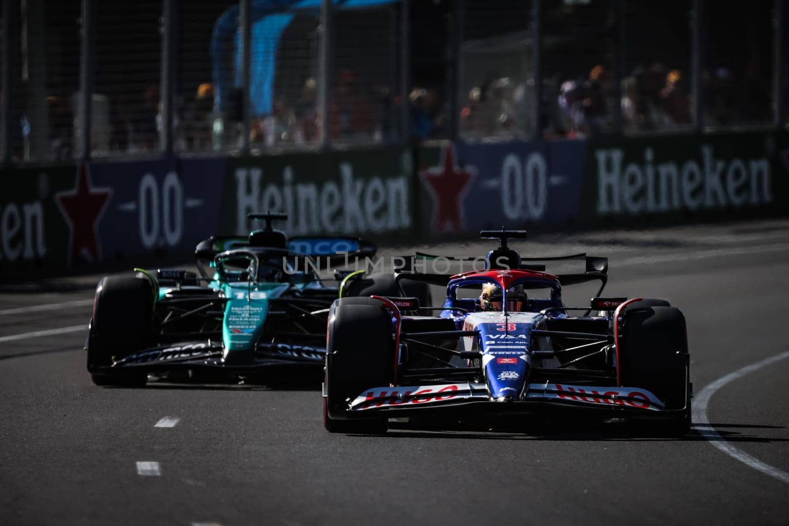 MELBOURNE, AUSTRALIA - MARCH 23: Daniel Ricciardo of Australia drives the Visa Cash App RB Formula One Team VCARB 01 ahead of Lance Stroll of Canada drives the Aston Martin AMR24 Mercedes during qualifying in the 2024 Australian Grand Prix at Albert Park in Melbourne, Australia