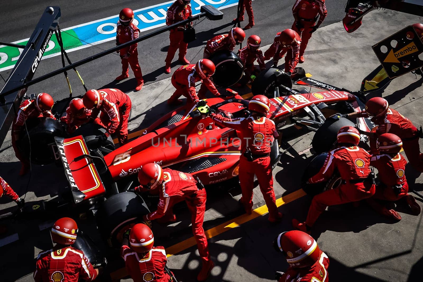 MELBOURNE, AUSTRALIA - MARCH 24: Carlos Sainz of Spain and Scuderia Ferrari pits on his way to winning the 2024 Australian Grand Prix at Albert Park in Melbourne, Australia