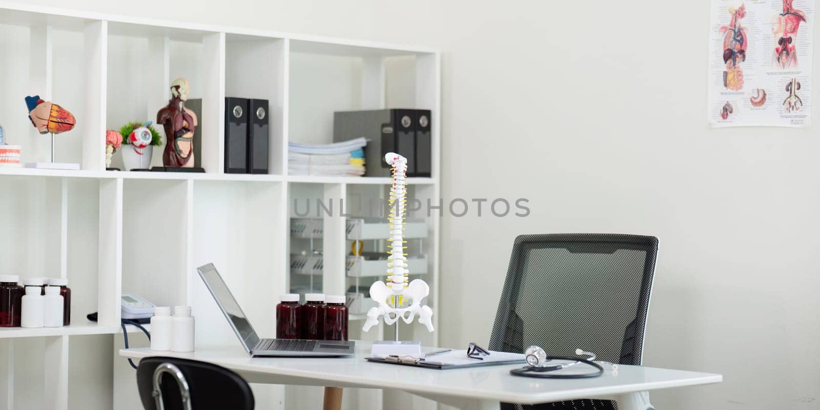 Interior of modern medical office doctor workplace.