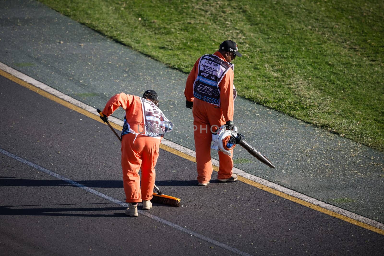 MELBOURNE, AUSTRALIA - MARCH 22: Marshalls clean track during qualifying at the 2024 Formula 2 Australian Grand Prix at Albert Park in Melbourne, Australia