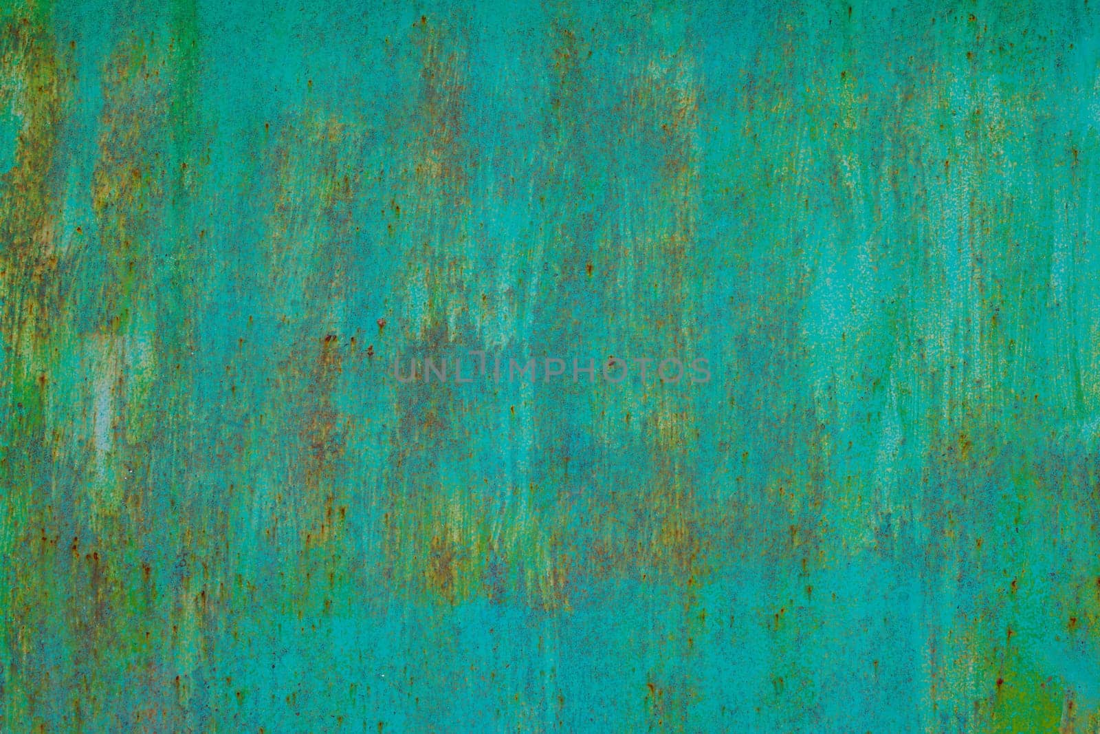 faded green paint on surface of flat sheet steel with stains of rust - full-frame background and texture by z1b