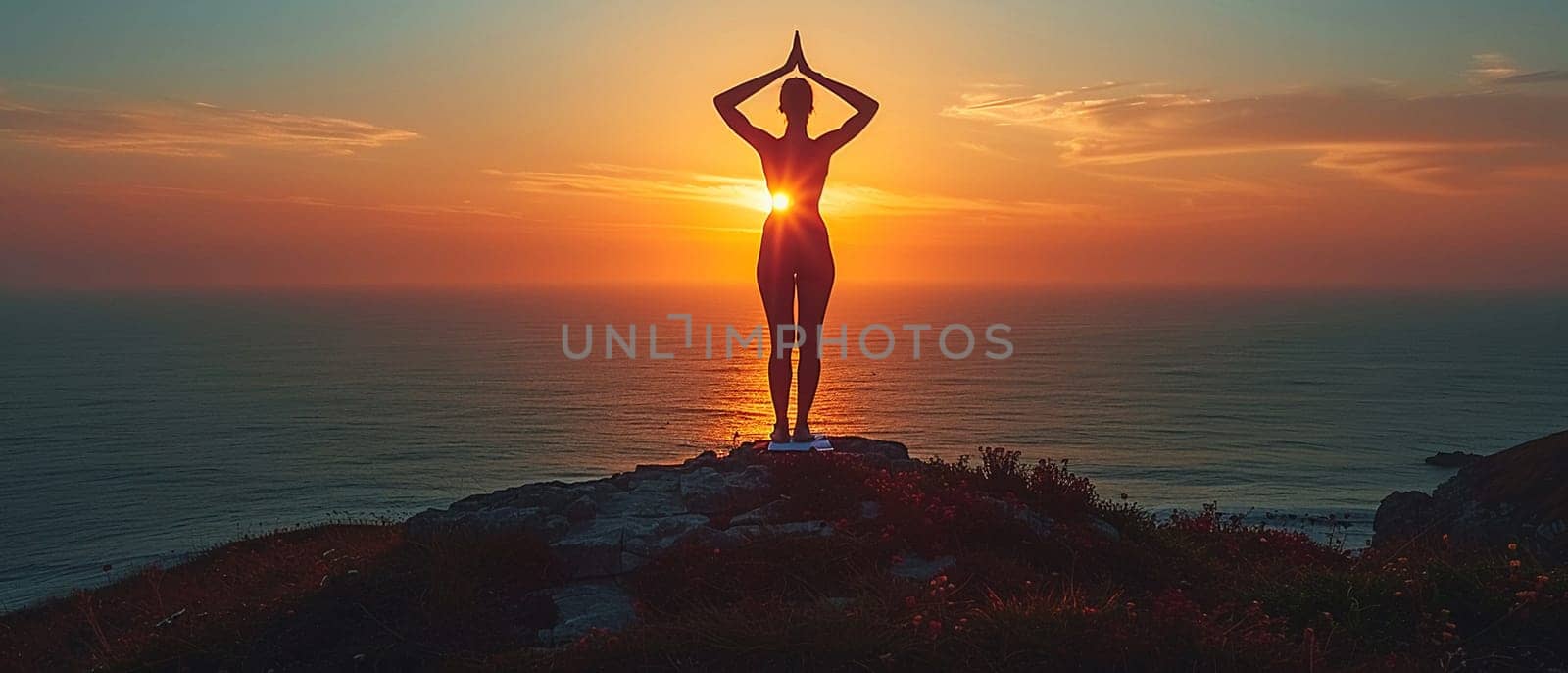 Silhouette of a yoga practice at dawn, representing tranquility and balance