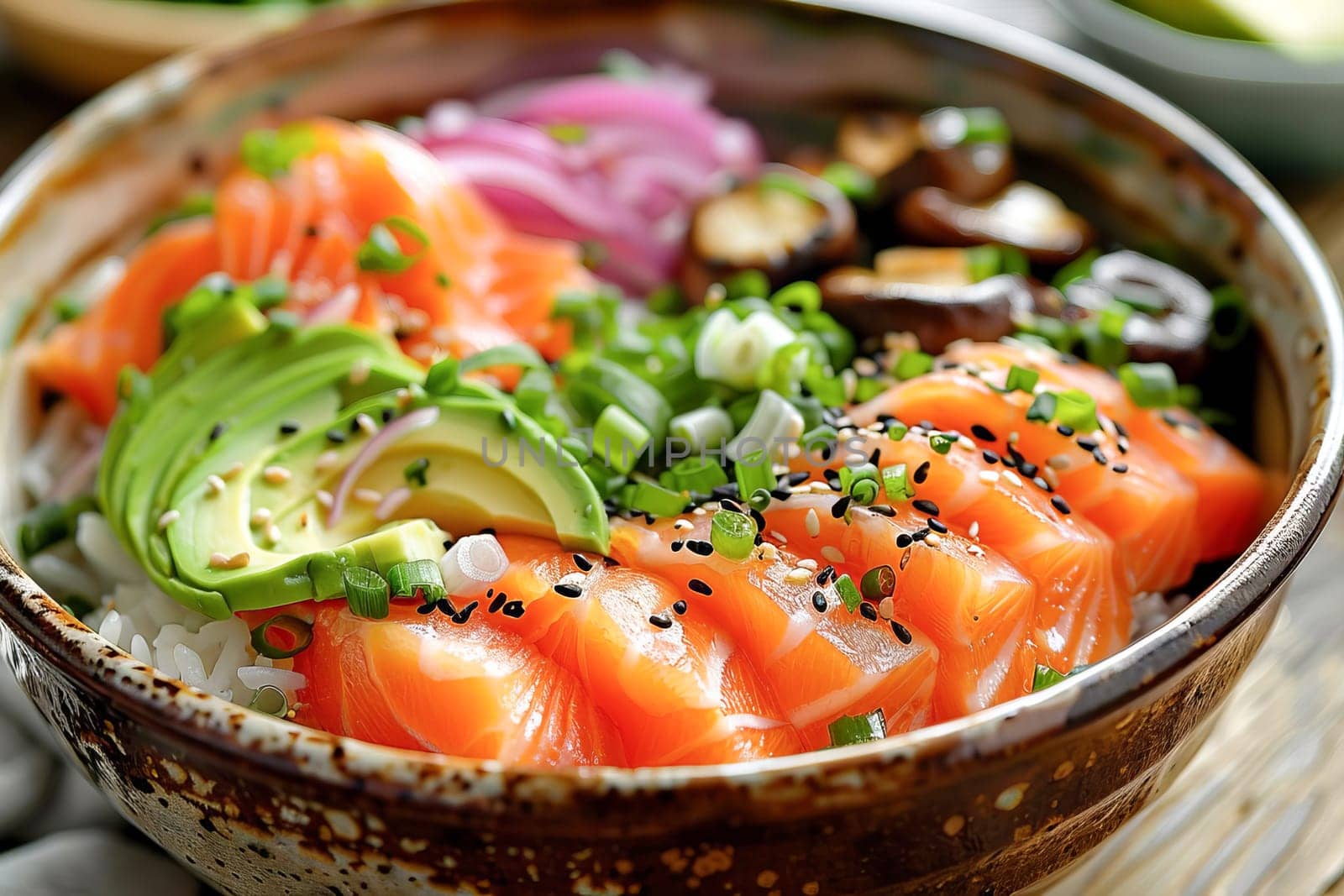 Bowl with salmon, avocado and other ingredients. Healthy food concept.